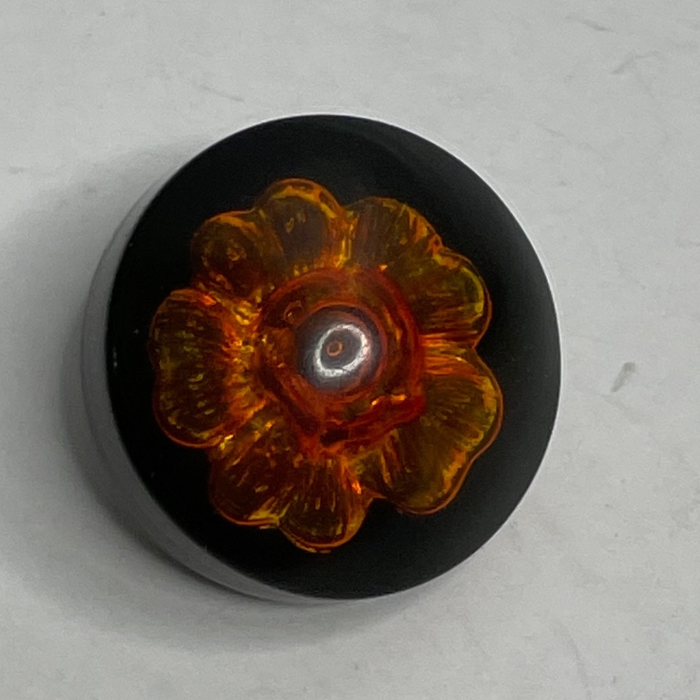 Vintage Chanel Brown Resin Amber Camellia Small Button on Black Background